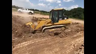 Caterpillar 953c pushing dirt