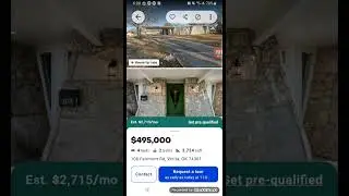 Каменный дом с круглой кладкой и камином-зоной отдыха, стоимостью менее 500 000 долларов.