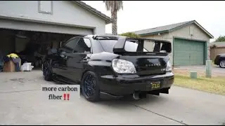 carbon fiber license plate frame install on my 04 sti