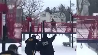 Watch These Officers Let Loose And Have A Snowball Fight With Kids During Storm