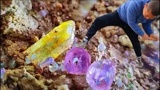 Crystal riverbed. A large number of crystals form clusters. Colorful minerals