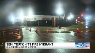 Semi-truck hits fire hydrant