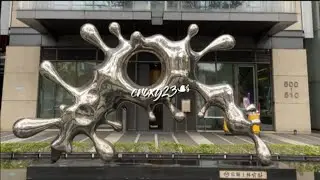 REFLECTION SCULPTURE - AN ABSTRACT PIECE THAT REFLECTS ITS SURROUNDINGS LIKE A MIRROR