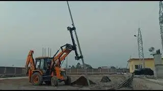 Pole planter attachment in JCB Backhoe loaders.