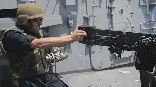 12.7 mm Machine Gun Shooting Aboard a U.S Destroyer Ship
