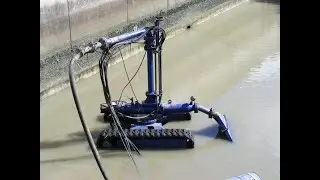 Remote control dredging and sludge processing