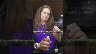 Tying off a decorative wrap on a custom fishing rod