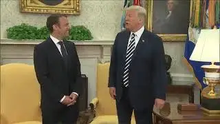 Dandruff diplomacy:Trump brushes 'dandruff' off Macron