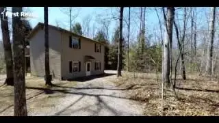 *Wooded Retreat with Creek and Waterfall*