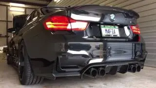 BMW M4FIA M4 with insane loud deep exhaust note with burbles overrun start up sequence