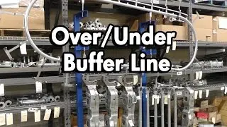 Over/Under Conveyor System for Buffering Parts