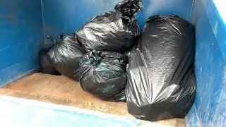 Compactor Container compact black bags again (Full HD)