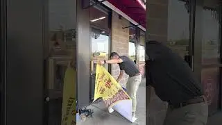 Easiest way to put a perforated sticker on a glass window or glass door.