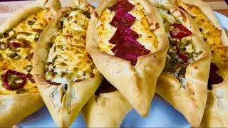 Home-style Manakish with cheese, beef and vegetables 