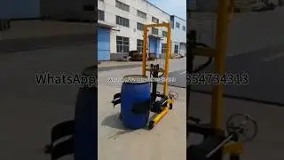 Chemical plastic barrel flipping and unloading elevator