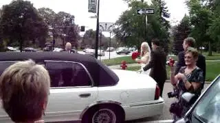 Brad and Reagan exit chuch via Limo...