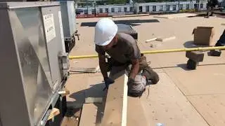 Installing Poly Iso Insulation and Sopraboard -- Soprema Commercial Roofing