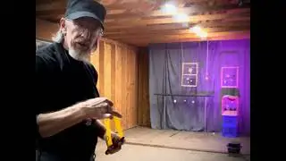 Shooting at a range of targets, 8cm-2cm, with my WJJ Knighthawk slingshot