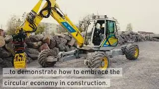 Autonomous excavator constructs a 6-meter-high dry-stone wall