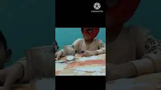 Science Experiment coin and card on glass of water