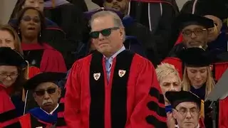 Crowd boos Warner CEO during college graduation speech