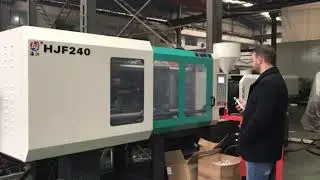 240ton PET injection molding machine for 28 neck size preform mould training in the factory