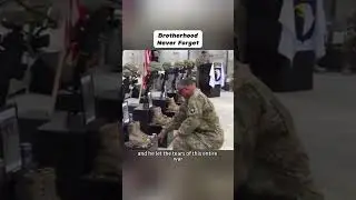 U.S. Sergeant Major overcome, kneels weeping at memorial for fallen comrades