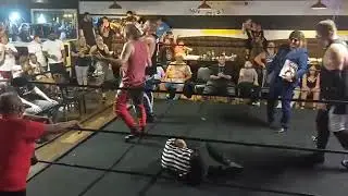 Detroit Red Wing DARREN MCCARTY handing out a stone cold stunner to Referee BRIAN GORIE