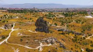 Dolly zoom. Goreme, Nevsehir, Turkey. Sky view of remarkable rock formation in Cappadocia showing...