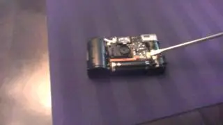 Discharge of a disposable camera's capacitor