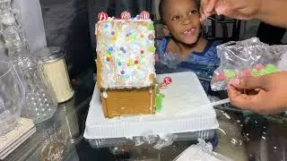 Jace makes dinosaur gingerbread house part 2