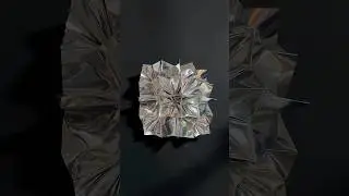Folding reflective sheet into geometric forms. Origami; Spark(Reflective sheet)