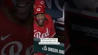Will Benson and Terry Francona share a fun moment.