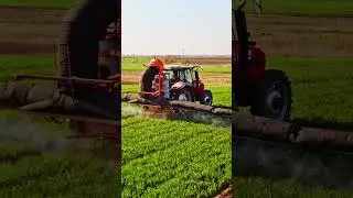 Tractor with Boom Spraying Pesticides on Agricultural Field | Afson Seeds