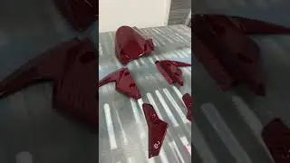 Custom hydro dipped red carbon triumph Motorcyle hydrographics road bike accent