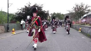 Blairgowrie, Rattray & District Pipe Band marching to the 2019 Braemar Gathering in Scotland
