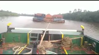 Tug Boat towing barge