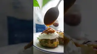 Vegetable patties with poached eggs and mushroom gravy