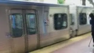 Police: commuters held up phones as woman raped