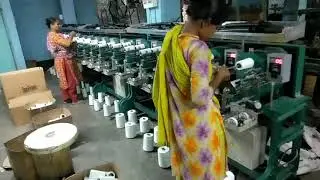 Cone winding machine