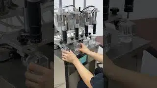 ZONESUN Semi Automatic 4 Heads Liquid Vacuum Perfume Filling Machine