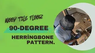 Wood tile floor in a 90-degree herringbone pattern.