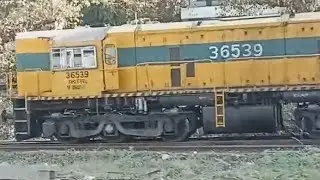 MANGO YELLOW SHUNTER ENGINE RESTS AT YARD WDS6 36539