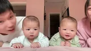 6663: Chinese twin babies showed contrasting reactions to their parents&rsquo; kisses