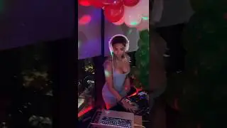 Dj spinning music and 5tables going for the Cinco de Mayo celebration inside the penthouse.