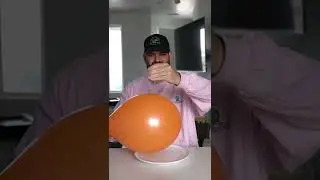 Pop a balloon with an ORANGE PEEL. No way 🤯 #shorts ￼￼