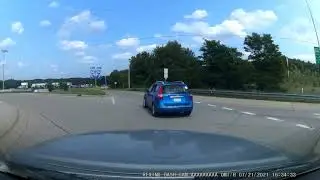 Garbage people in Michigan roundabout