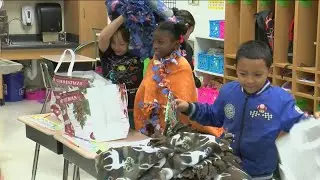 Traumatic brain injury survivors donate 70 handmade blankets, books to kids at Navarre Elementary