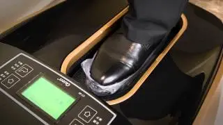 Automatic thermo shrinkable shoe cover machine