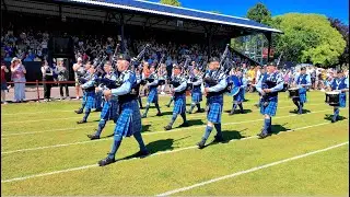 RAF Lossiemouth Pipes and Drums march in during 2025 Inverness Highland Games in Scotland